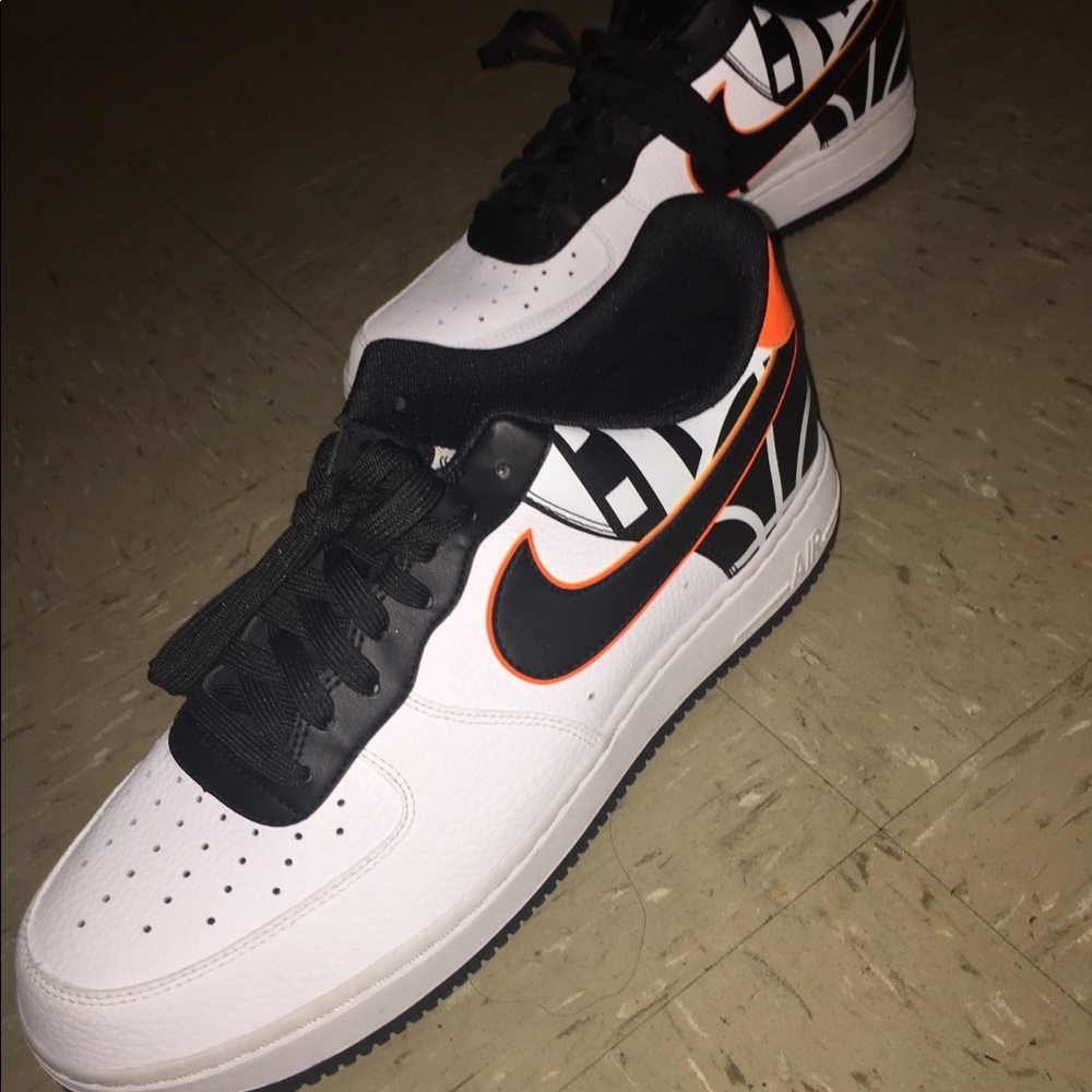 Orange and white nikes